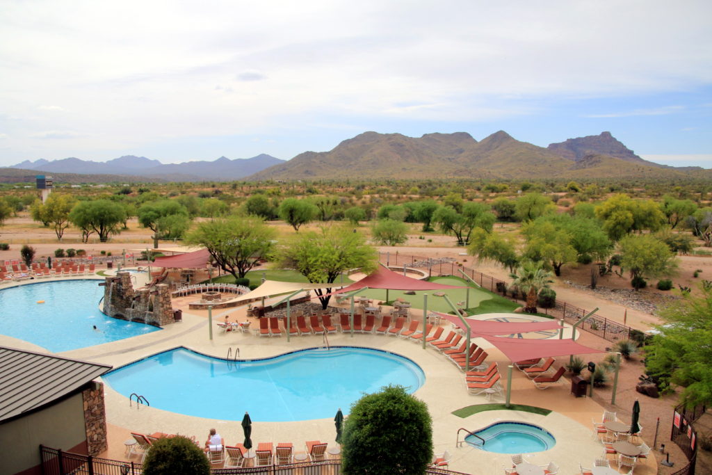 The view to the back of the We-Ko-Pa Resort includes a pool, desert, and mountains.